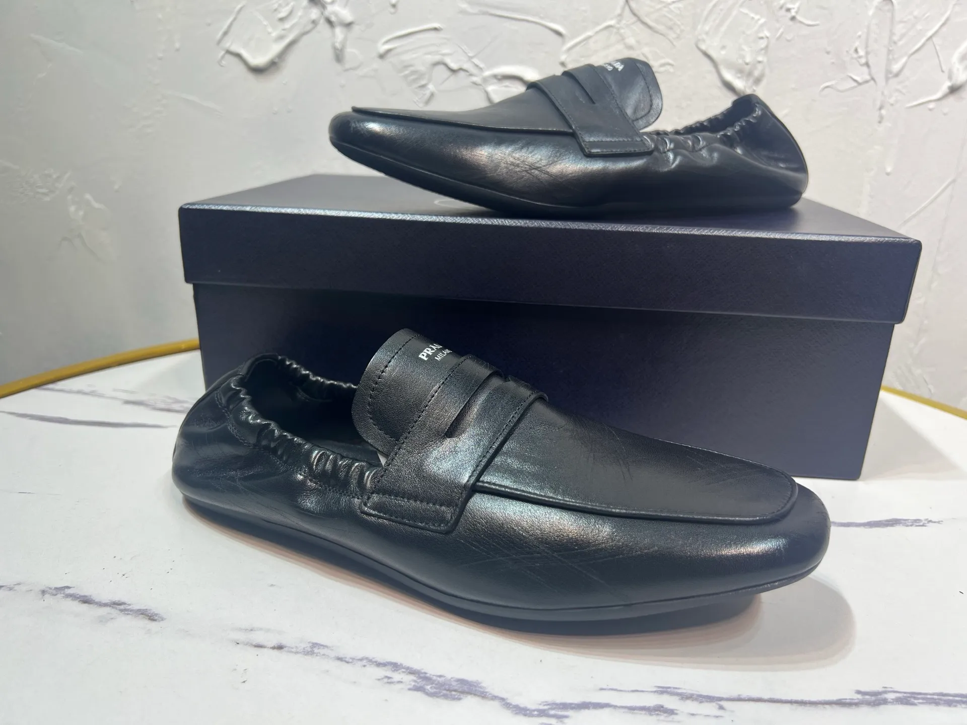 P780 prada derby2025 spring and autumn latest Prada one-legged retro men's loafers, Shuffle hollowed-out men's shoes, upper cowhide, lining and foot cowhide, rubber sole, black and brown 2-color original packaging Code number: 39-46
